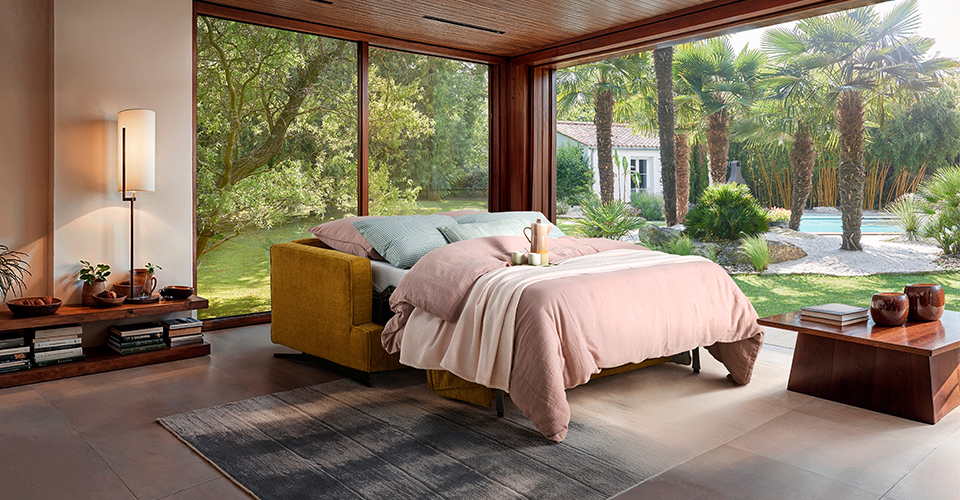 canapé convertible style campagne avec tissu naturel et ambiance rustique