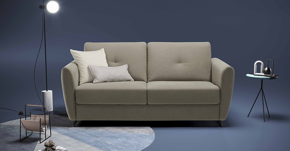 canapé convertible installé dans un open space moderne et lumineux pour créer un espace détente professionnel