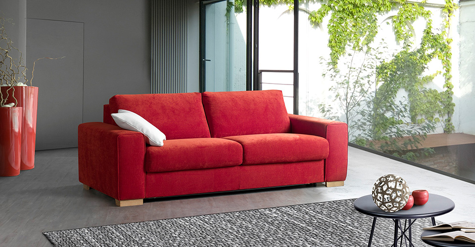 Canapé convertible dans un salon à la décoration de style industriel